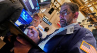 Stock market today: World shares are mixed and US futures jump ahead of Wall St reopening from holiday