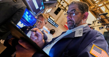 Stock market today: World shares are mixed and US futures jump ahead of Wall St reopening from holiday