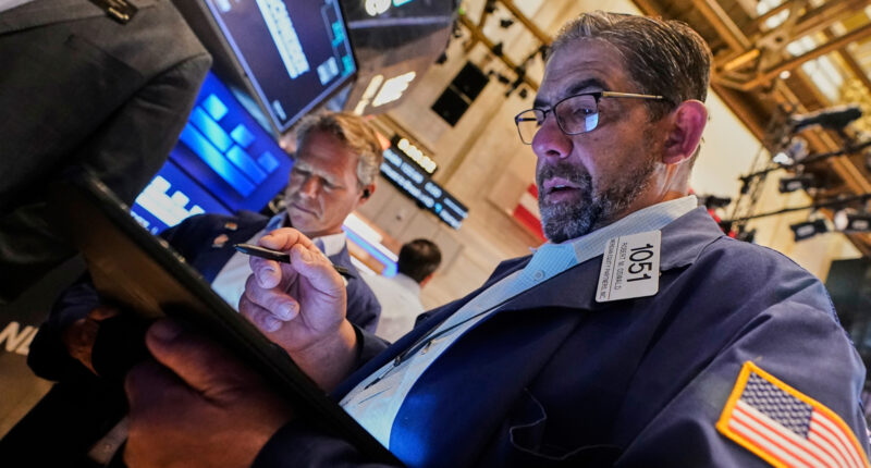 Stock market today: World shares are mixed and US futures jump ahead of Wall St reopening from holiday