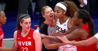 Tempers flare between Caitlin Clark and Angel Reese in WNBA opener as Chicago Sky star is held back from rival