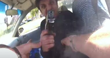 Terrifying bodycam shows moment driver pulls gun & shoots cops at point-blank range after ranting about the Taliban