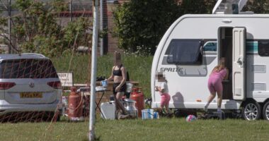 Travellers invade school playing fields forcing furious head teacher to relocate lessons and admit it will be difficult to evict them