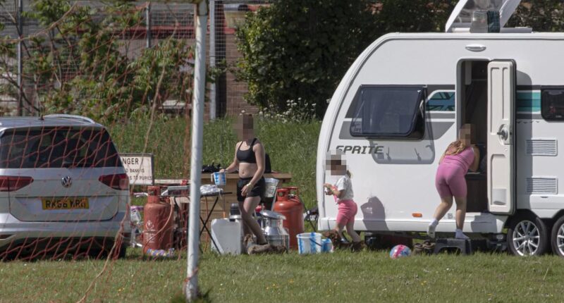 Travellers invade school playing fields forcing furious head teacher to relocate lessons and admit it will be difficult to evict them