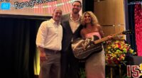 Travis Kelce poses with fans who bought stunning Taylor Swift merch at Patrick Mahomes' charity event