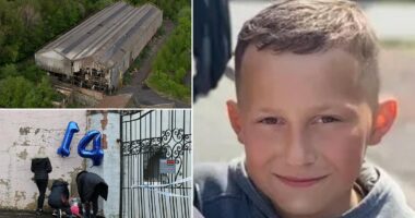 Tributes pour in for boy, 14, killed in fire at derelict warehouse - as 14 children are arrested over death