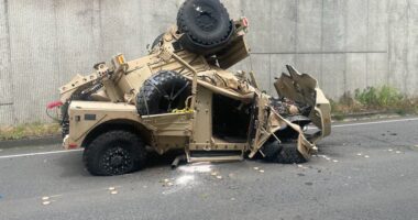 Two injured after military vehicle crashes over highway retaining wall, plunges 30 feet onto road below