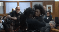 Watch moment massive courtroom brawl erupts as mom of murdered teen, 14, confronts his killer’s family