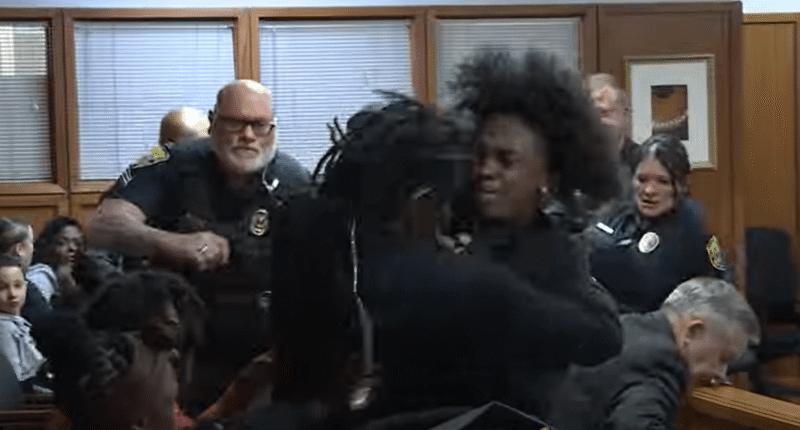 Watch moment massive courtroom brawl erupts as mom of murdered teen, 14, confronts his killer’s family