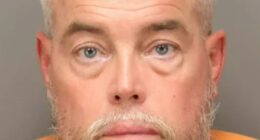 Winner of $167.3m Powerball pot ‘punches man before kicking cop in hotel brawl’ days after landing state’s biggest prize