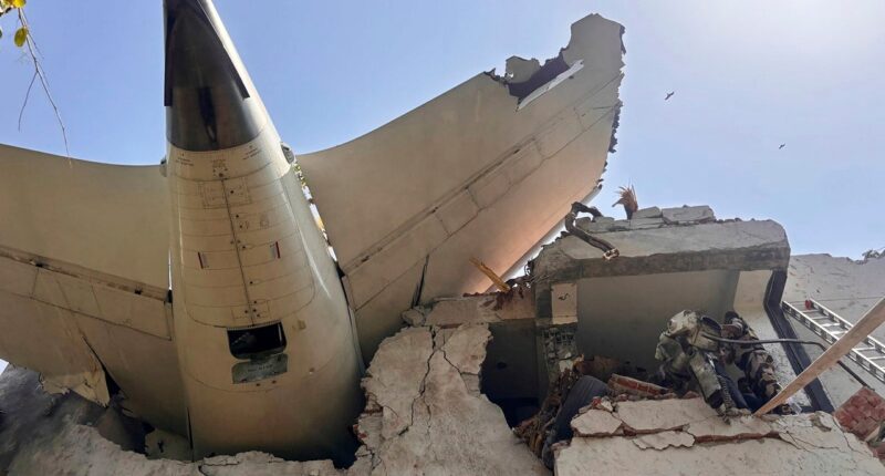 Air India flight bound for London crashes with 242 onboard, as reports emerge of a survivor