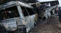 At least 40 killed as two buses crash and burst into flames – leaving terrified passengers trapped inside vehicles