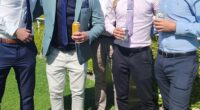 Bradley Turner (second from the left) was scammed out of nearly $17,000