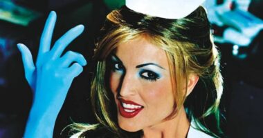 Busty Blink 182 album model looks worlds away from iconic cover 26 years on - see her now