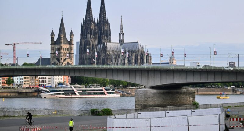 Cologne evacuation: Around 20,000 are ordered out of German city centre after three huge unexploded WW2 bombs are found
