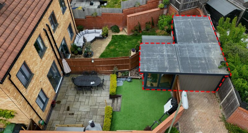 Couple locked in neighbour row ordered to tear down home gym as war over parking spaces erupts… they say ‘it’s not us’