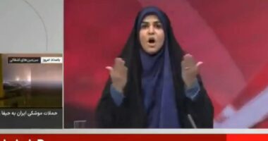 Dramatic moment Iran state TV station is BLITZED in Israeli strike during live propaganda broadcast as presenter flees