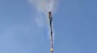 Eight die as hot-air balloon bursts into flames and plunges to the ground in Brazil - after 14 jumped to safety before craft burned completely
