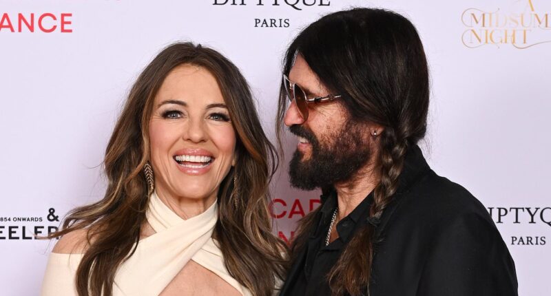 Elizabeth Hurley looks loved-up with boyfriend Billy Ray Cyrus as actress stuns in a plunging midi dress at The Royal Academy of Dance event