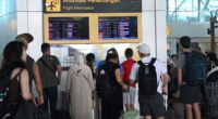 Even MORE tourist hotspot flights cancelled after gargantuan volcanic eruption that spewed ash & sparked tsunami fear