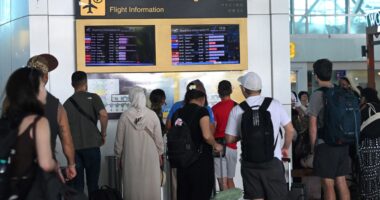 Even MORE tourist hotspot flights cancelled after gargantuan volcanic eruption that spewed ash & sparked tsunami fear