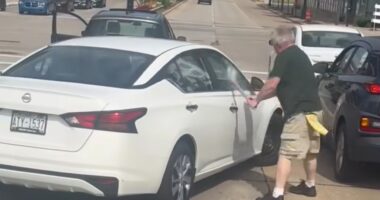 Explosive moment fuming driver pounds ‘idiot’ motorist’s car with bat before he’s almost squashed by bumper