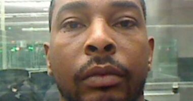 Fugitive accused of wiping out New York family including kids aged two and four is captured in tourist spot