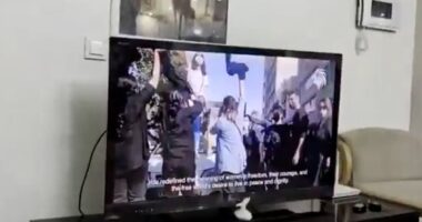 Hackers 'breach Iranian TV' as country's Supreme Leader threatens the US with an 'all-out' war