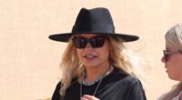 Holly Willoughby oozes festival chic in a leggy black mini dress and fedora as she leads the celebrities on the second day of sun-soaked Glastonbury