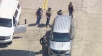 ICE agents descend on Dodger Stadium two weeks after riots that brought LA to its knees