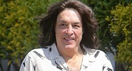 Iconic '80s lead singer who was born without an ear looks unrecognizable in rare outing... can you guess who?