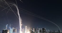 Israeli Iron Dome air defense system fires to intercept missiles over Tel Aviv, Israel, Friday, June 13, 2025. (AP Photo/Tomer Neuberg)
