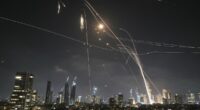 Iranian ballistic missiles rain down on Tel Aviv with skies ablaze after Iran vowed 'revenge' on Israel for nuclear site attacks