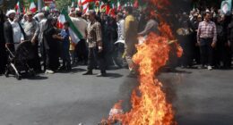 Iranians BURN US & Israel flags and chant ‘we want to DIE for Ayatollah’ as thousands join ‘death to the West’ protests