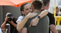 Jennifer Garner shares an intimate moment with boyfriend John Miller as he sweetly supports her running event