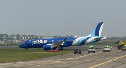 JetBlue plane skids off runway at Boston Logan Airport with all flights halted as rescue crews swarm aircraft