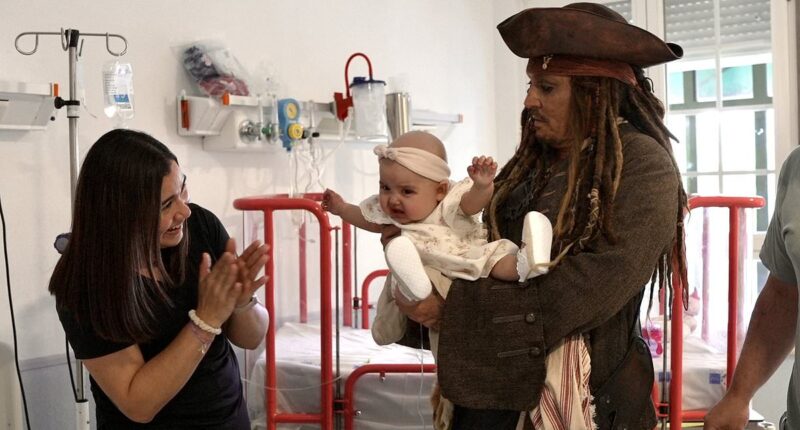 Johnny Depp visits kids at hospital in Spain… where ex-wife Amber Heard now lives