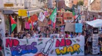 'Kisses yes, Bezos No,' protesters say, as Bezos wedding bonanza stirs controversy in Venice