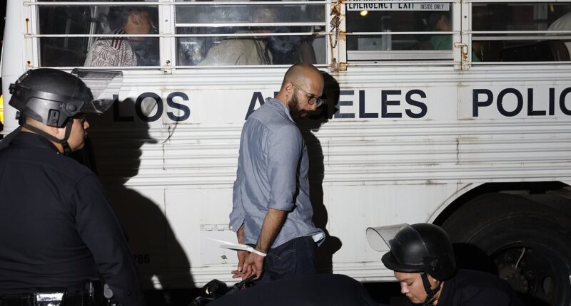 LA fights back with immigration protesters zip-tied and loaded onto buses en masse as Marines head in