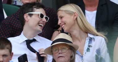 Lady Gabriella Kingston returns to Wimbledon: Royal looks in good spirits as she shares a laugh in the VIP box with friend Robert Denning - a year after her husband's death