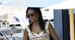 Michelle Obama enjoys intimate lunch with longtime male friend as she jets off on lavish Spain getaway WITHOUT Barack