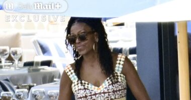 Michelle Obama enjoys intimate lunch with longtime male friend as she jets off on lavish Spain getaway WITHOUT Barack