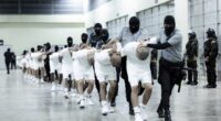 Migrants sent to notorious El Salvador prison must get a chance to challenge their deportation, judge rules