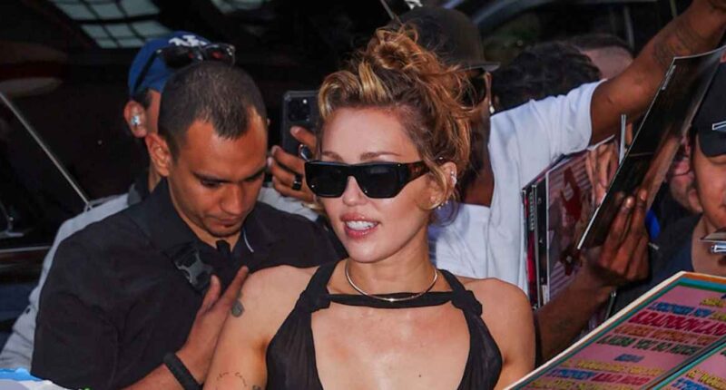 Miley Cyrus Shows Off Her Bust in Sheer Dress That Barely Covers Her Nipples