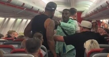 Moment 'feral' Brit tries to provoke another passenger on chaotic flight to Ibiza