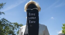 Moment crowd of women's rights campaigners dressed in Niqab-style veils ripped them off to declare 'free your face' in provocative London protest