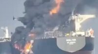 Moment huge flames leap from cargo ship as ‘dark fleet’ tanker burns at sea after being ‘hit by another boat’