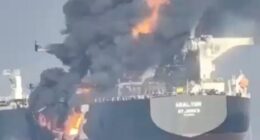Moment huge flames leap from cargo ship as ‘dark fleet’ tanker burns at sea after being ‘hit by another boat’