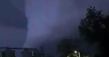 Moment huge wedge tornado with terrifying black funnel rips path of destruction in deadly electric storms killing three