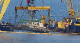 Moment tragic Bayesian yacht wreck is raised from depths after billionaire Mike Lynch, daughter & 5 others died on board