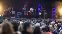 Music festival halted after band member 'collapses on stage' in front of horrified crowd